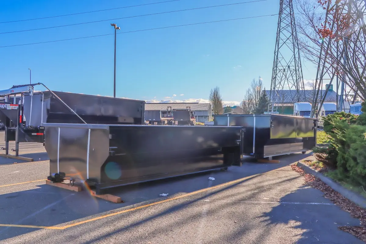 Roll-off dumpster ready for waste disposal at job site for 4 Yard Dumpster Rental in Hasbrouck Heights